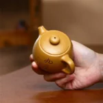 Handmade Duan Clay Ding Yixing Teapot - Gongfu Gift (Three-Legged) - Image 4